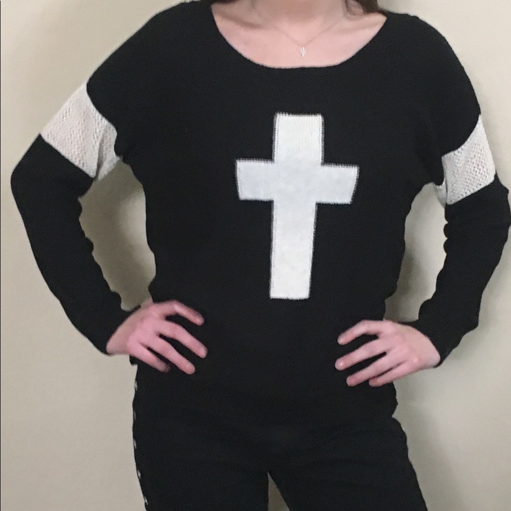 Black sweater with cross